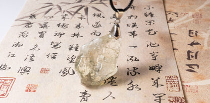 Clear Quartz Raw Stone Pendant  with Green Glow