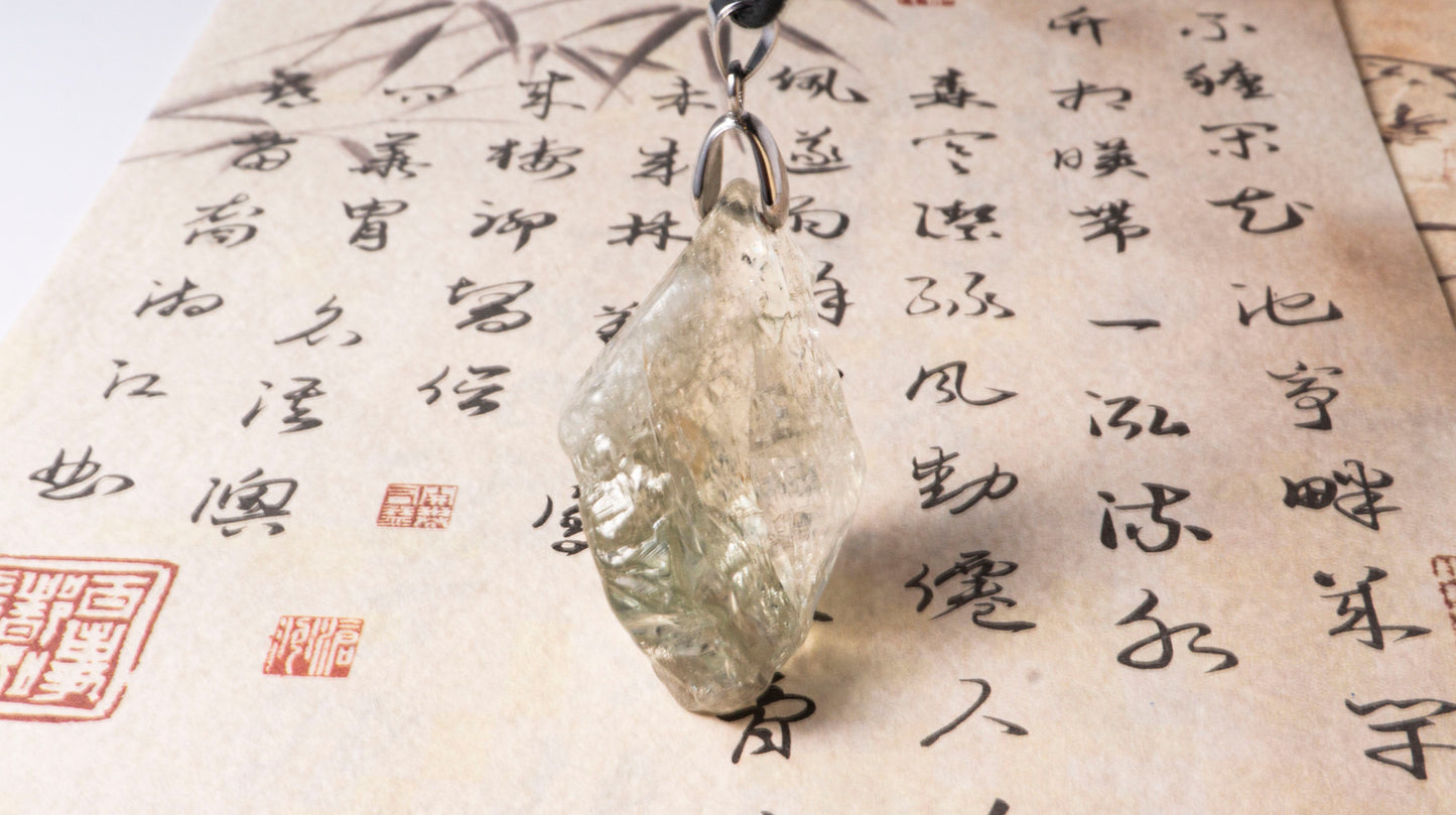 Clear Quartz Raw Stone Pendant  with Green Glow